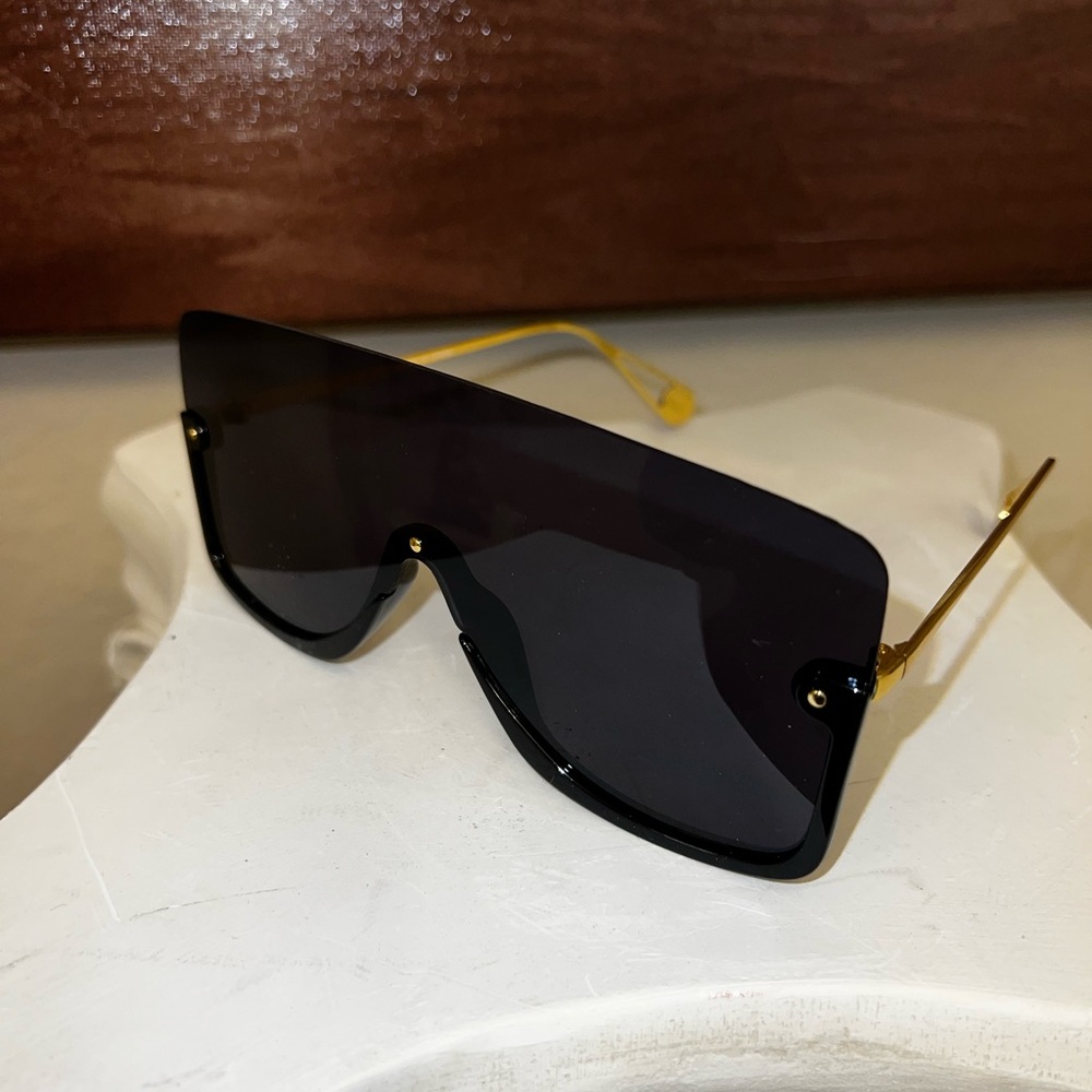 Square flat top sleek sunglasses with gold trim hardware